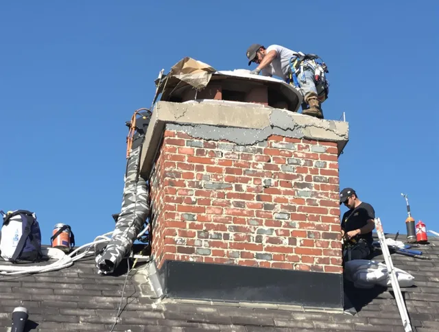 Arcadia Chimney Sweep installing a custom chimney crown in Arcadia, CA